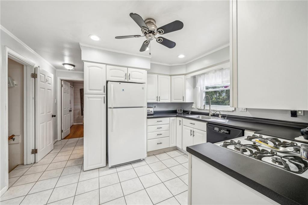 1013 Silver Lane McKees Rocks, PA 15136 - Photo 7 of 33 Kitchen with a built in pantry with pull-out drawers