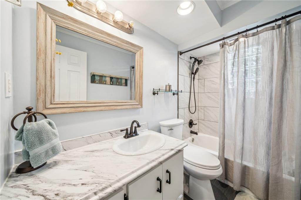 1013 Silver Lane McKees Rocks, PA 15136 - Photo 10 of 33 Updated Bathroom with Tile Shower combo.