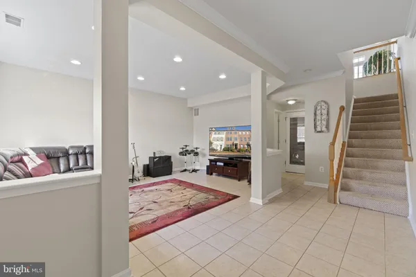 a view of a living room and entry way