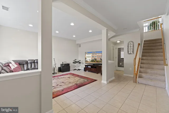 a view of a living room and entry way