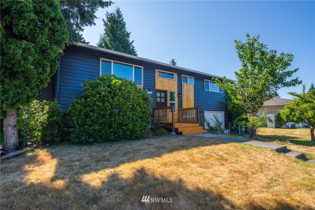 16504 124th Avenue Southeast Renton, WA 98058 - Photo 3 of 29 a view of a house with a yard