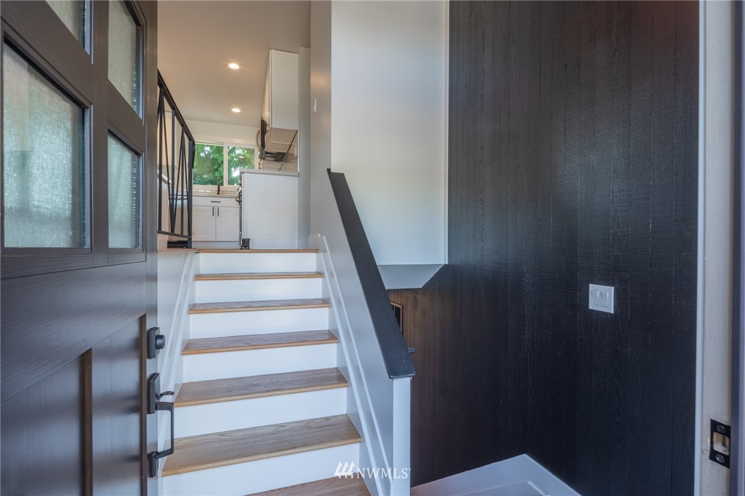 16504 124th Avenue Southeast Renton, WA 98058 - Photo 4 of 29 a view of entryway and hall with wooden floor