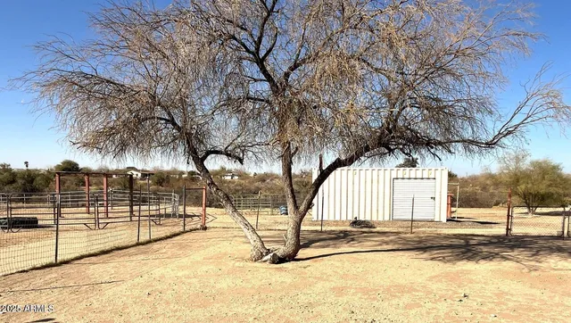 a view of a backyard of a house