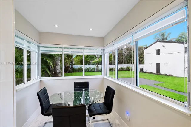 a view of a dining room with furniture