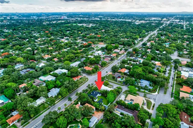 an aerial view of a house with a garden