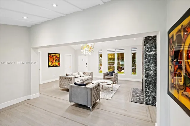 a living room with furniture and a window