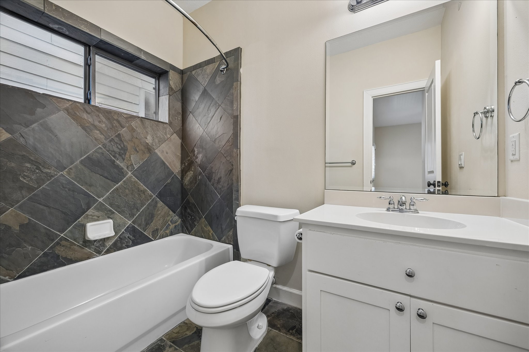 5811 Maxie Street Houston, TX 77007 - Photo 13 of 19 a bathroom with a sink toilet and shower
