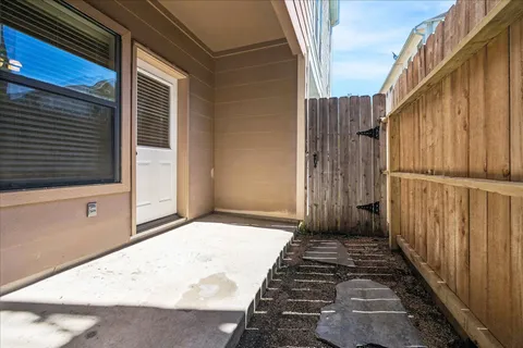 a view of a back yard of the house