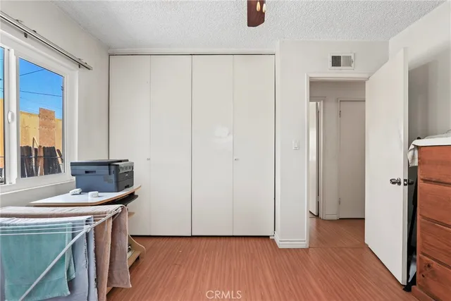 a room with a sink and a mirror