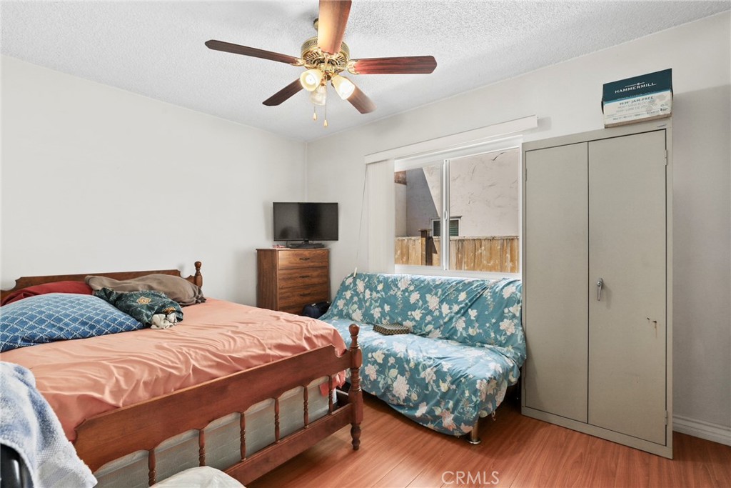 2508 El Paseo Alhambra, CA 91803 - Photo 14 of 21 a bedroom with a bed and a couch