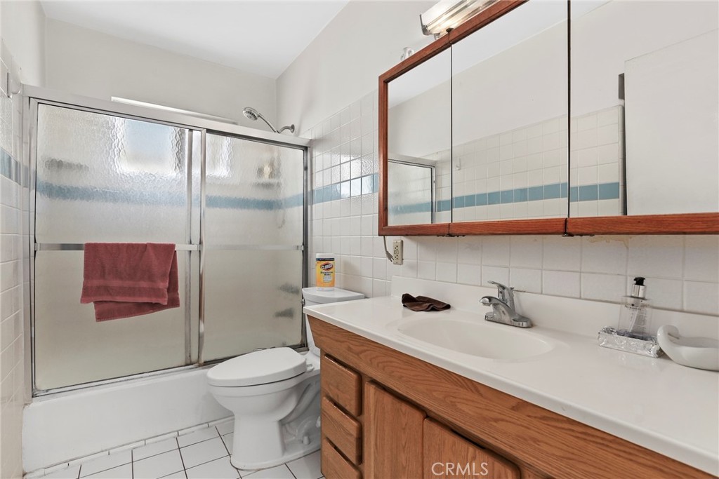 2508 El Paseo Alhambra, CA 91803 - Photo 16 of 21 a bathroom with a sink a toilet and shower