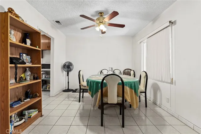 a view of a workspace with furniture