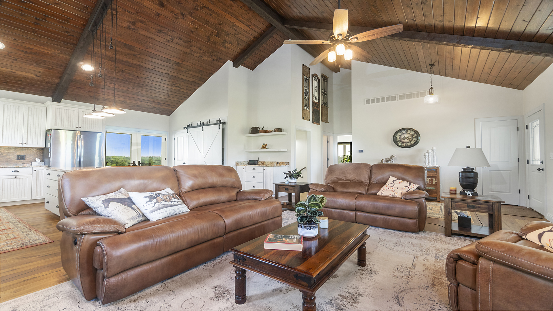 5465 West Penn Corner Road Oregon, IL 61061 - Photo 28 of 56 a living room with furniture and a chandelier
