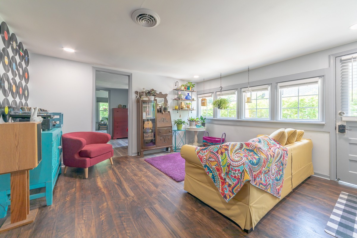 409 South 11th Street Clarksville, TN 37040 - Photo 11 of 29 a bedroom with a bed and wooden floor