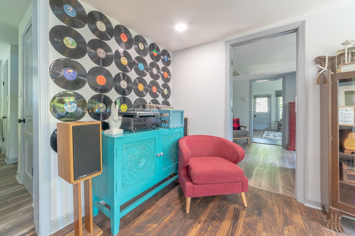 409 South 11th Street Clarksville, TN 37040 - Photo 12 of 29 a living room with furniture and a mirror