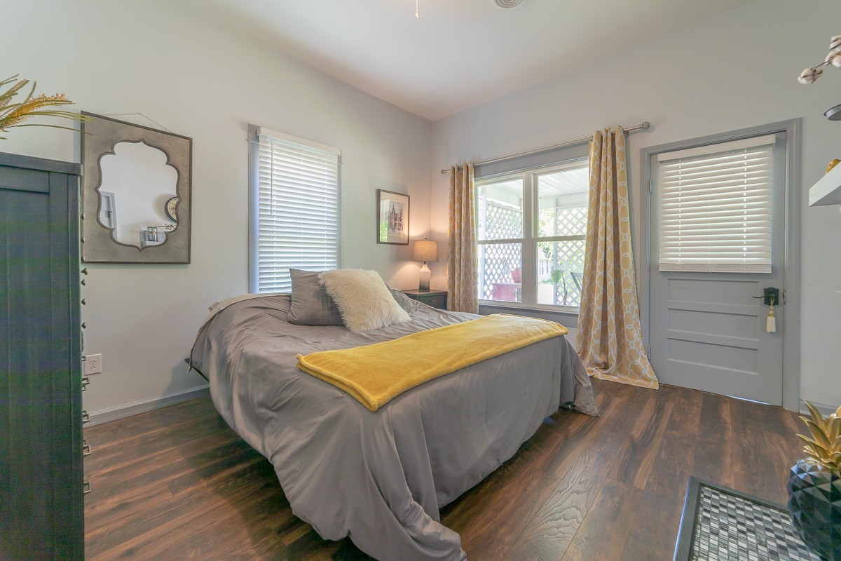 409 South 11th Street Clarksville, TN 37040 - Photo 15 of 29 a bedroom with bed and wooden floor