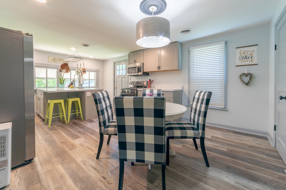 409 South 11th Street Clarksville, TN 37040 - Photo 9 of 29 a view of a dining room with furniture and wooden floor