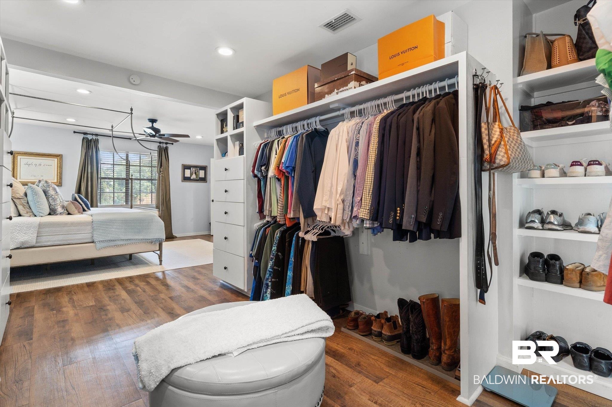 254 Woodlands Avenue Mobile, AL 36607 - Photo 21 of 50 Spacious closet with dark wood-style flooring