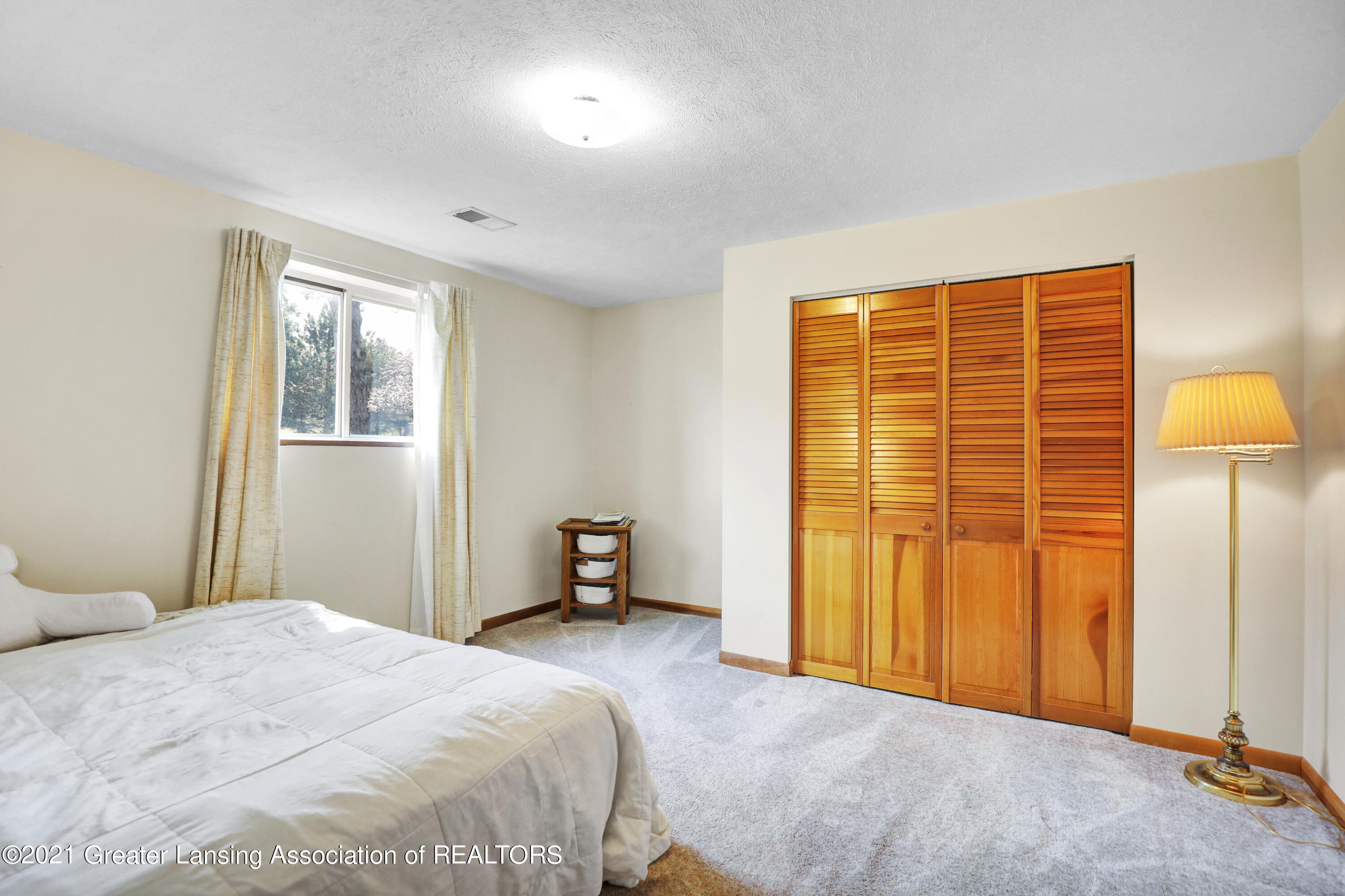 5475 Harper Road Holt, MI 48842 - Photo 23 of 33 3 rd bedroom