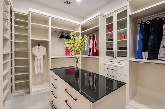 a kitchen with a refrigerator and a sink