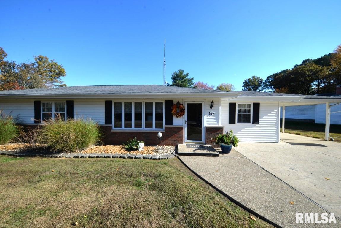 10 Edgewood Drive Mount Vernon, IL 62864 - Photo 2 of 41 a front view of a house with a garden and patio