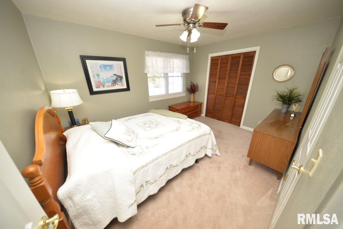 10 Edgewood Drive Mount Vernon, IL 62864 - Photo 27 of 41 a bedroom with a bed and window
