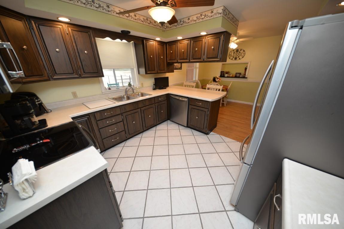 10 Edgewood Drive Mount Vernon, IL 62864 - Photo 34 of 41 a kitchen with a sink and cabinets