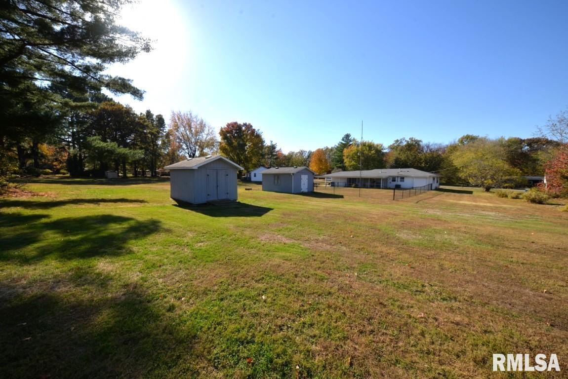 10 Edgewood Drive Mount Vernon, IL 62864 - Photo 4 of 41 a view of a swimming pool and trees