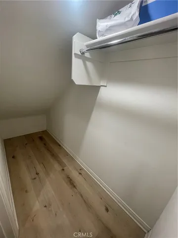 a bathroom with a sink toilet and mirror