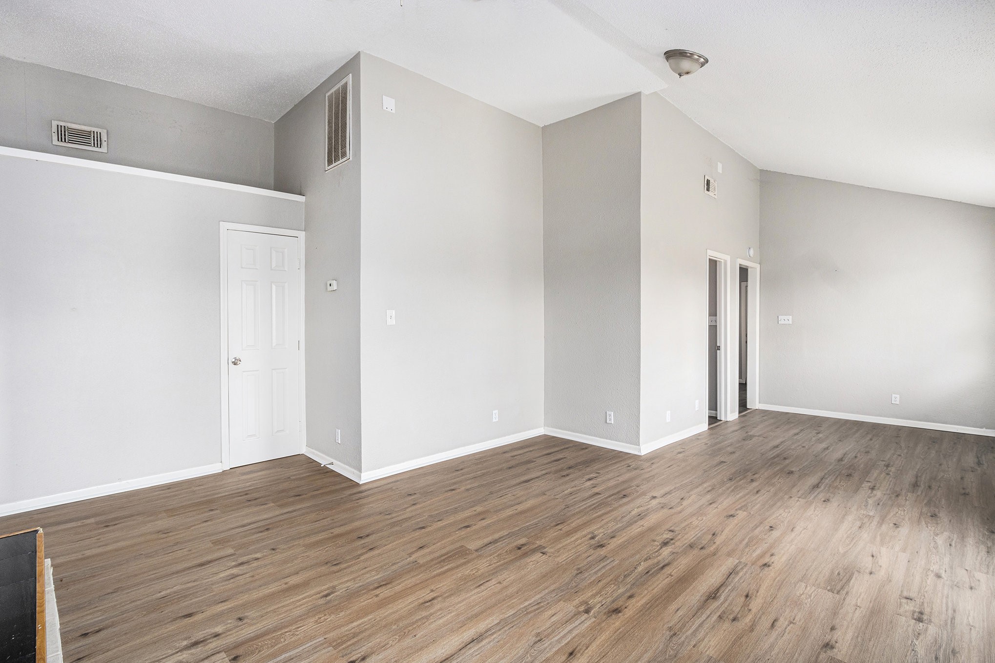 16226 Alden Ridge Drive Houston, TX 77053 - Photo 16 of 22 a view of an empty room with wooden floor