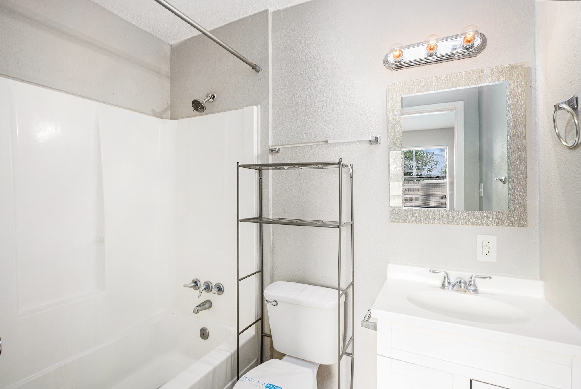 16226 Alden Ridge Drive Houston, TX 77053 - Photo 17 of 22 a bathroom with a sink toilet and shower