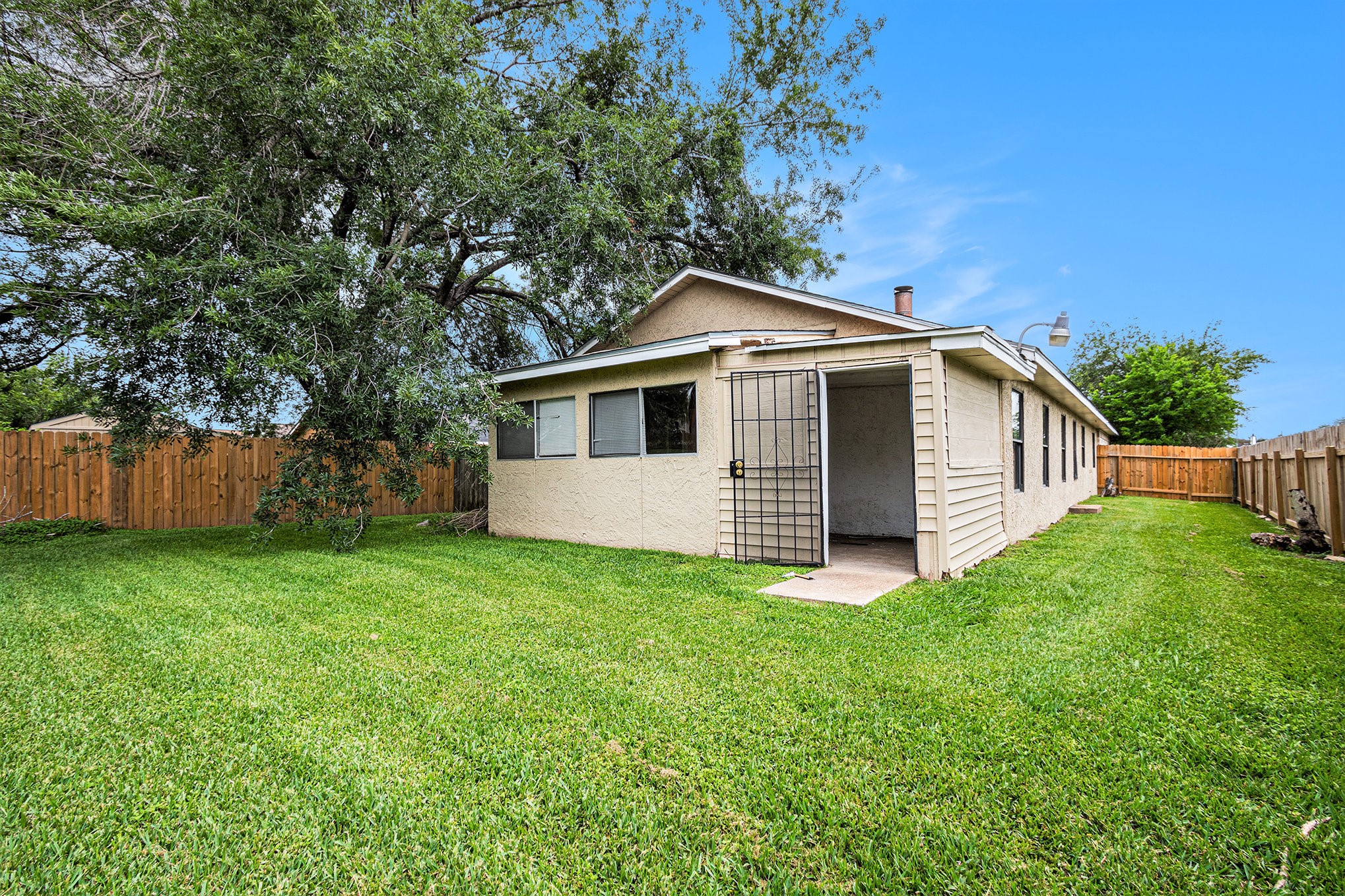 16226 Alden Ridge Drive Houston, TX 77053 - Photo 21 of 22 a front view of a house with yard and green space