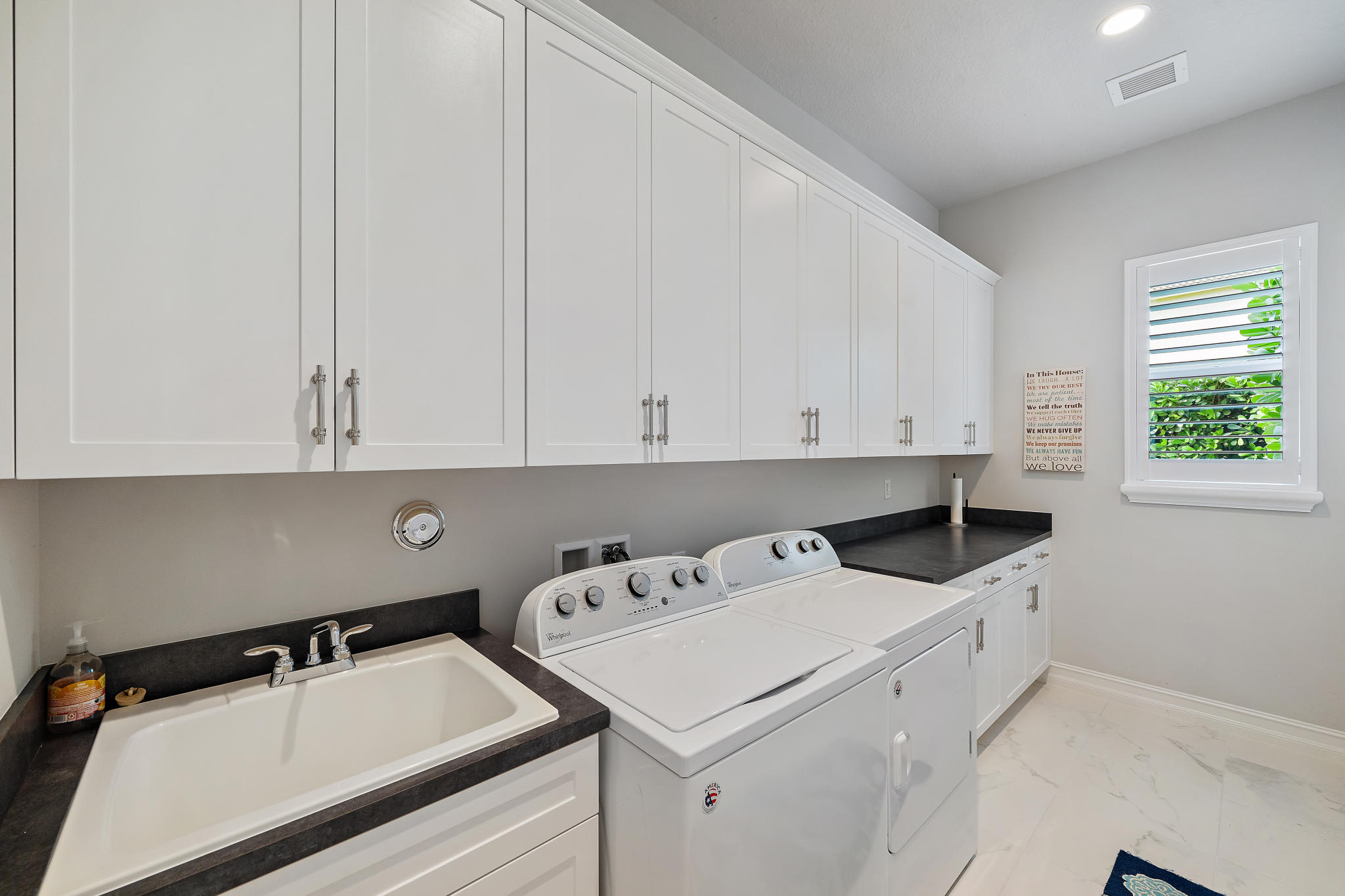 129 Sonata Drive Jupiter, FL 33478 - Photo 37 of 64 laundry room w/ sink