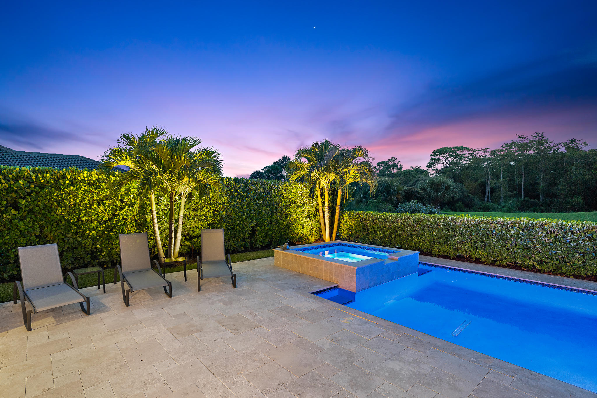129 Sonata Drive Jupiter, FL 33478 - Photo 46 of 64 pool + spa at dusk