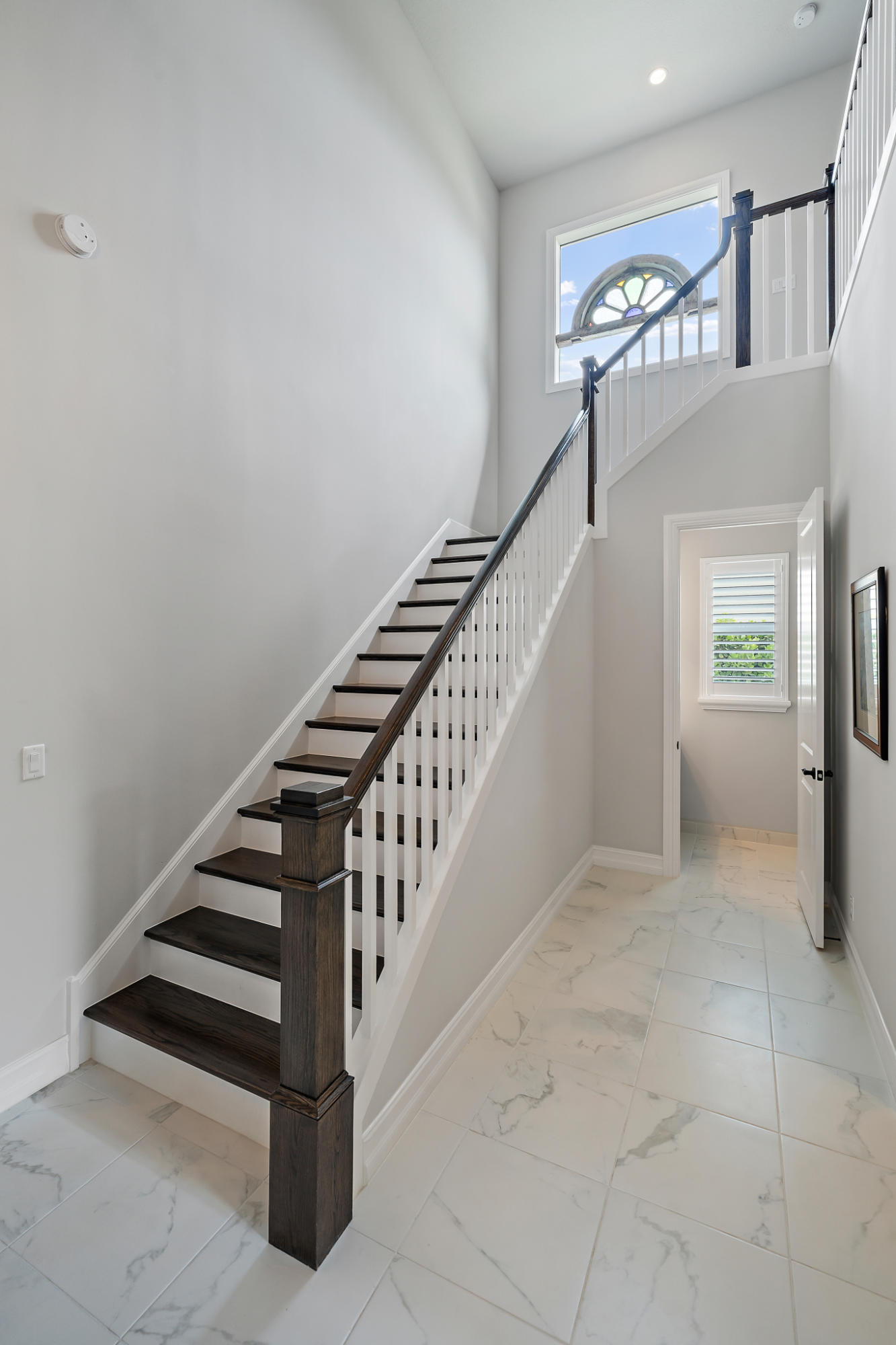 129 Sonata Drive Jupiter, FL 33478 - Photo 6 of 64 stairs + powder room