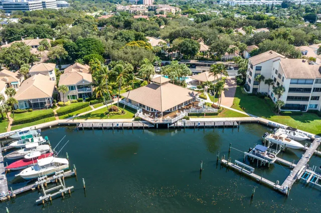an aerial view of a house with a ocean view
