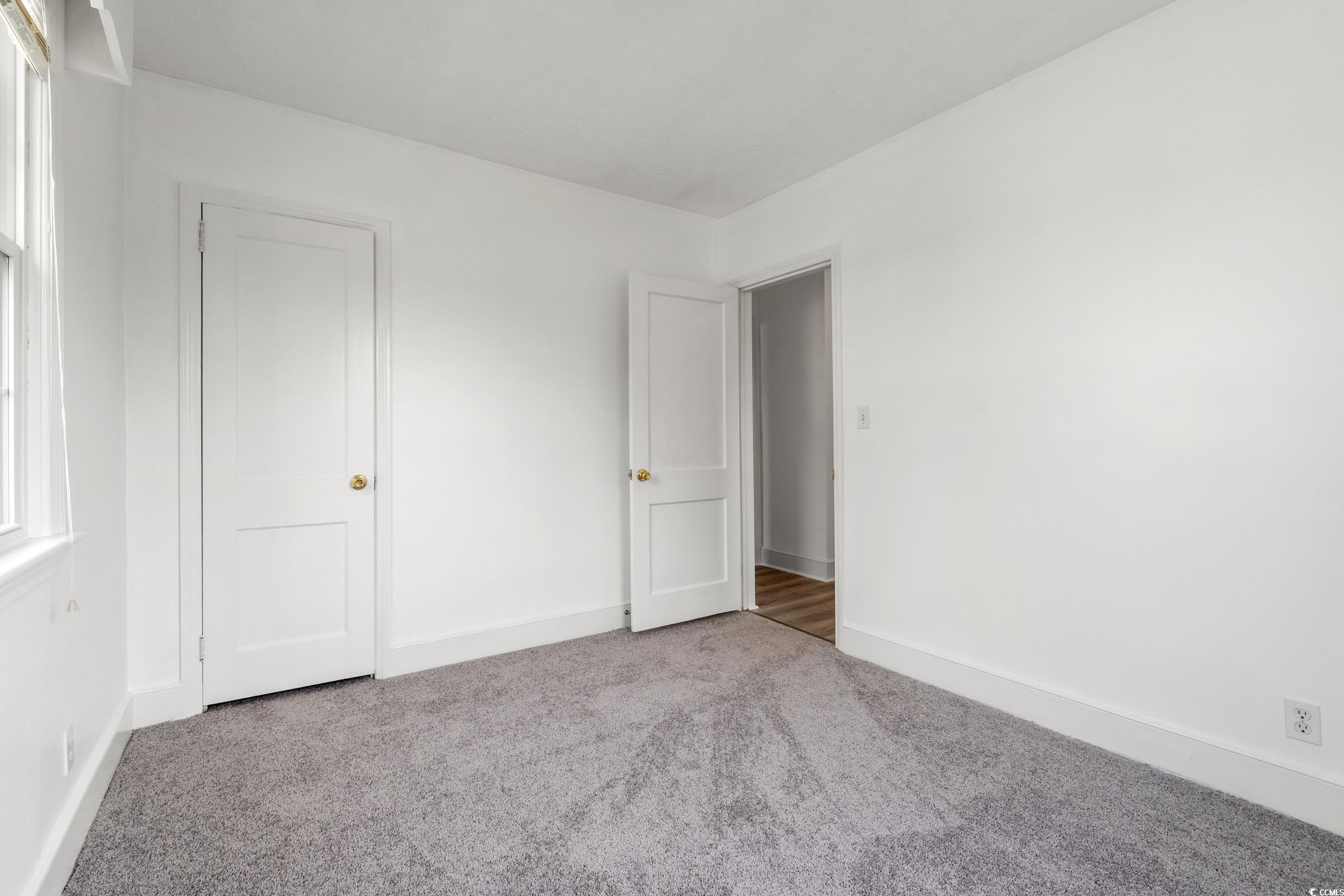 4162 Stevens Street Loris, SC 29569 - Photo 19 of 37 Unfurnished bedroom featuring carpet flooring and