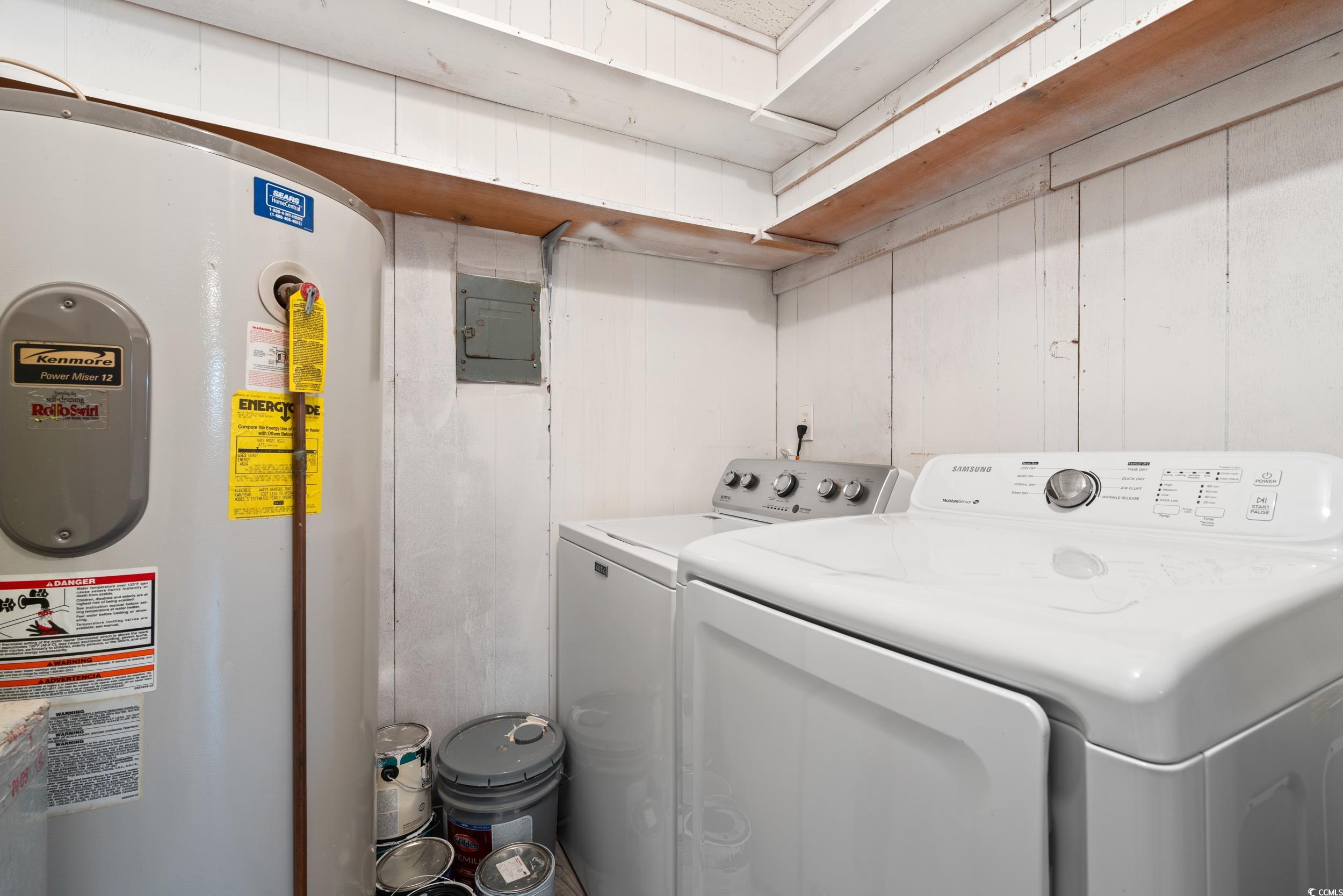 Washroom with electric water heater, laundry area,