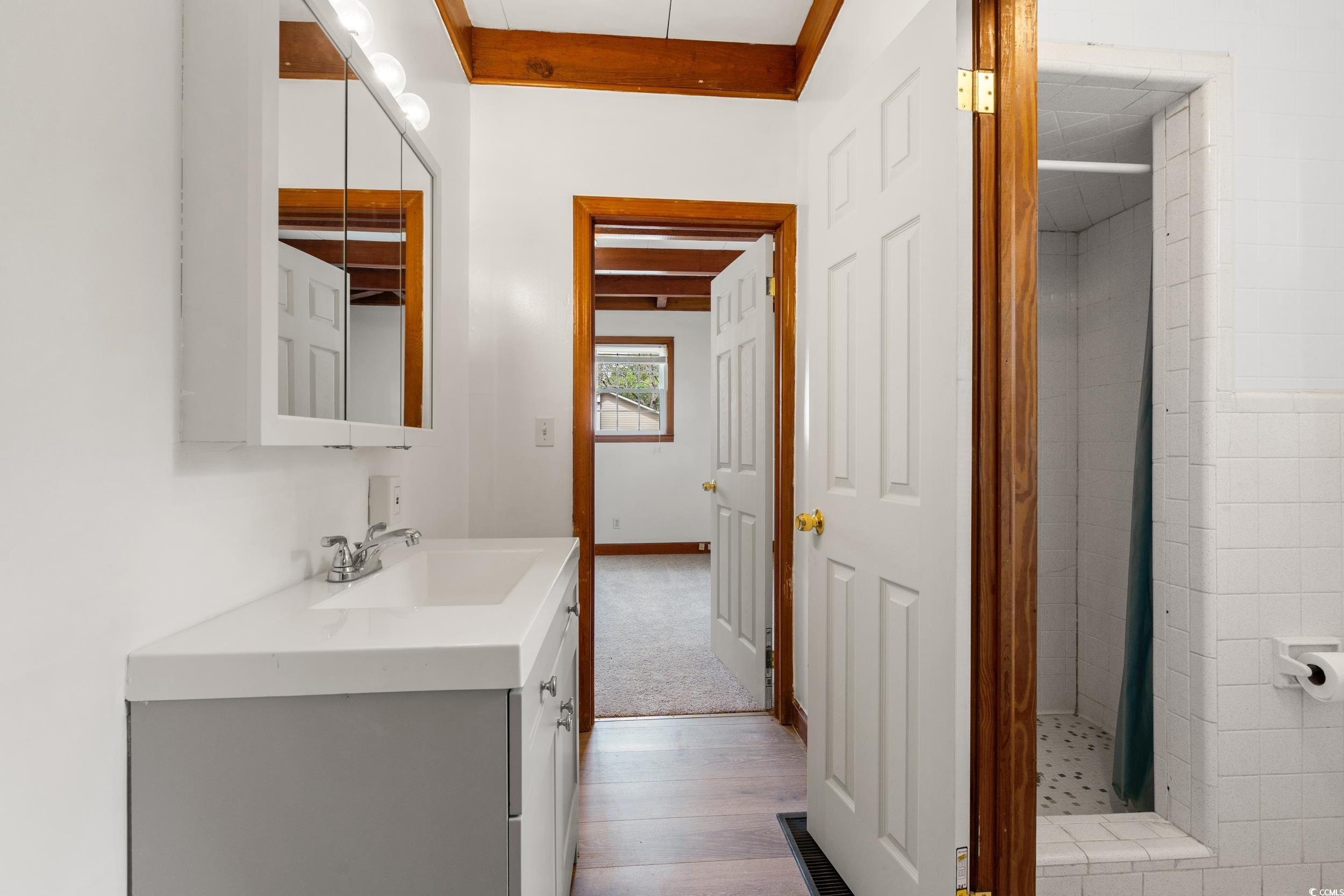 4162 Stevens Street Loris, SC 29569 - Photo 8 of 37 Full bath featuring a shower stall, vanity, and wo