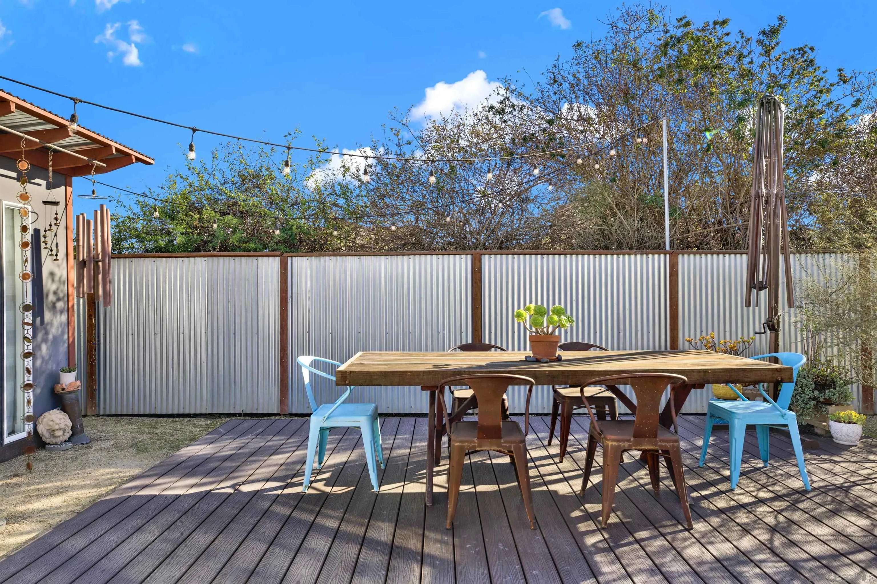 4005 Celeste Drive Oceanside, CA 92056 - Photo 16 of 18 a patio with table and chairs