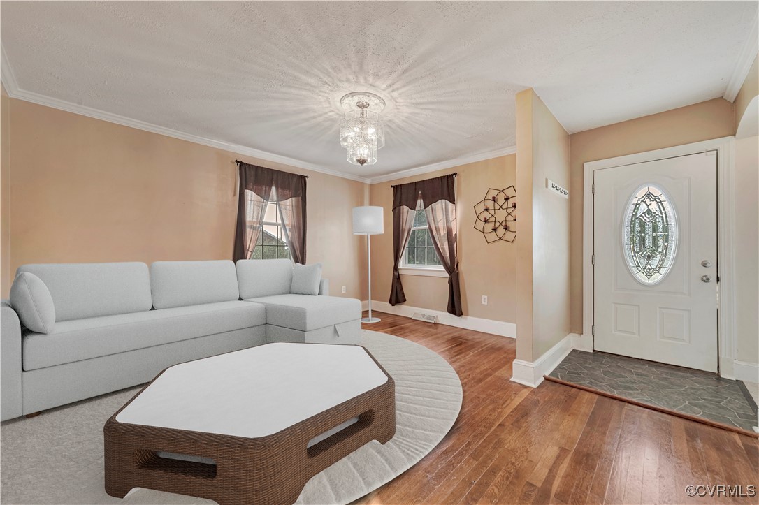 4305 Lakeview Road Petersburg, VA 23803 - Photo 14 of 45 Living/ Dinning room with a chandelier, hardwood /