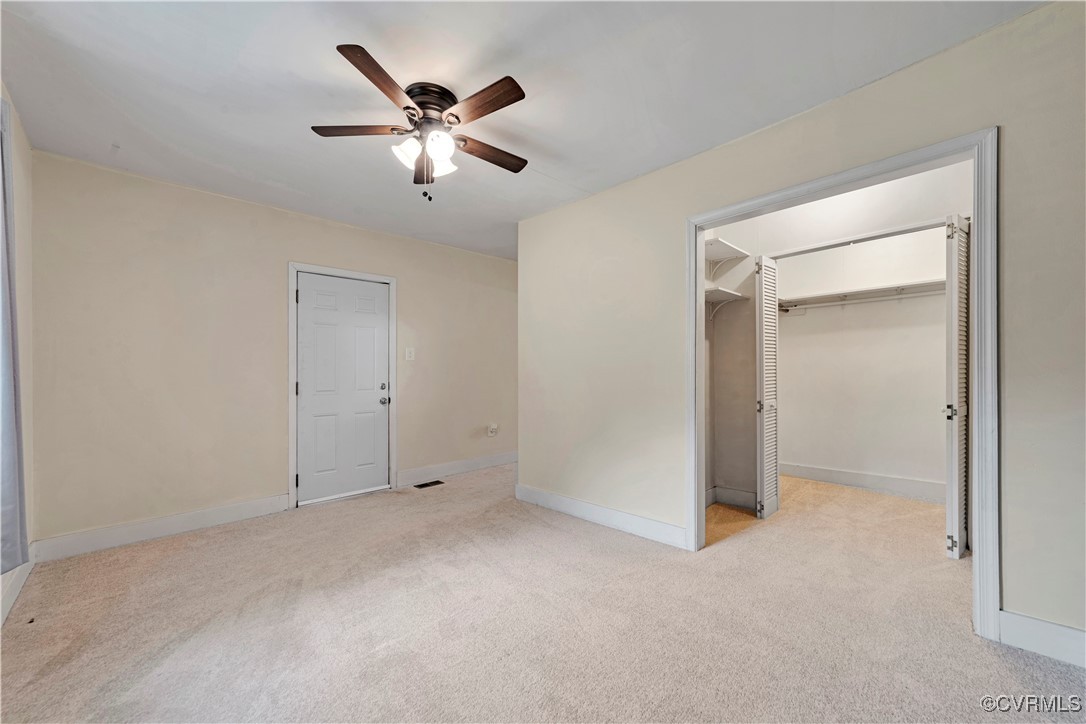 4305 Lakeview Road Petersburg, VA 23803 - Photo 18 of 45 Primary bedroom featuring carpet, a ceiling fan, a