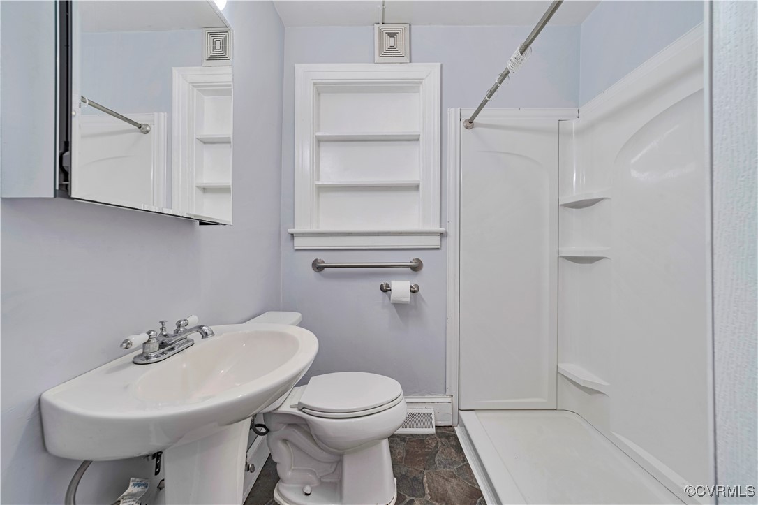 4305 Lakeview Road Petersburg, VA 23803 - Photo 24 of 45 Full bath with a stall shower and stone finish flo