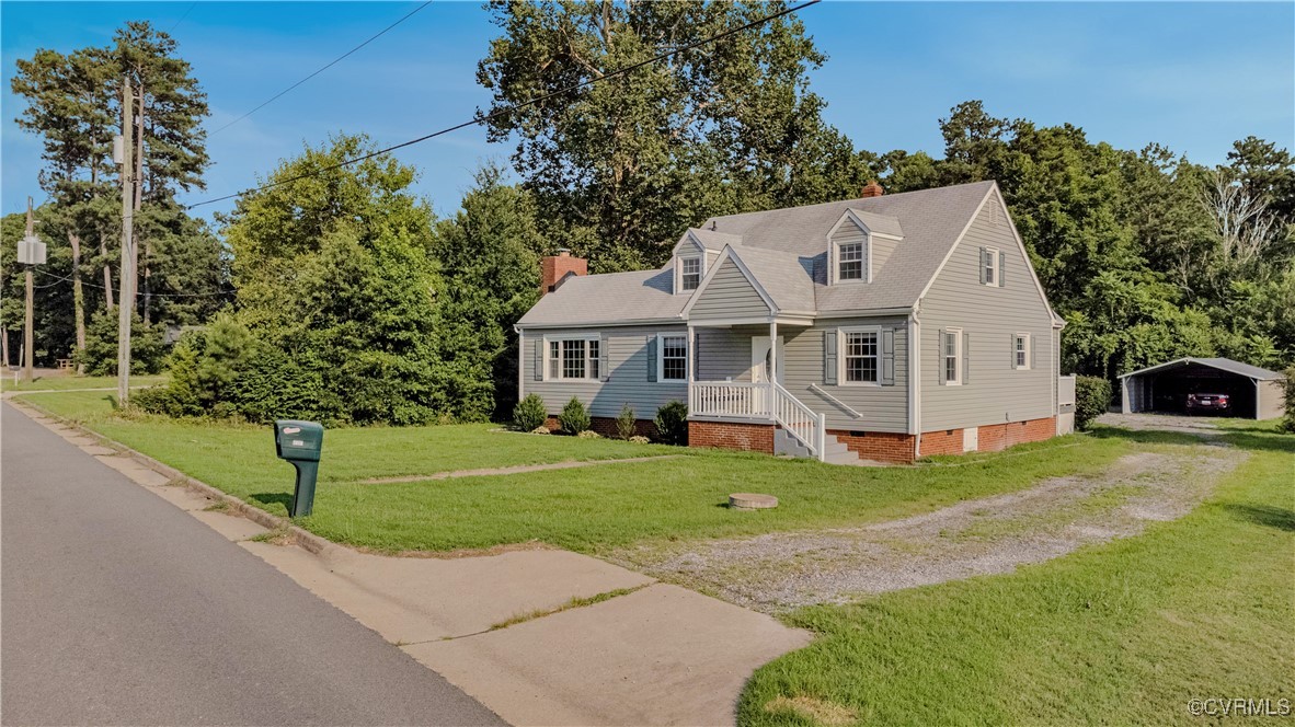 4305 Lakeview Road Petersburg, VA 23803 - Photo 3 of 45 New england style home featuring a carport, drivew