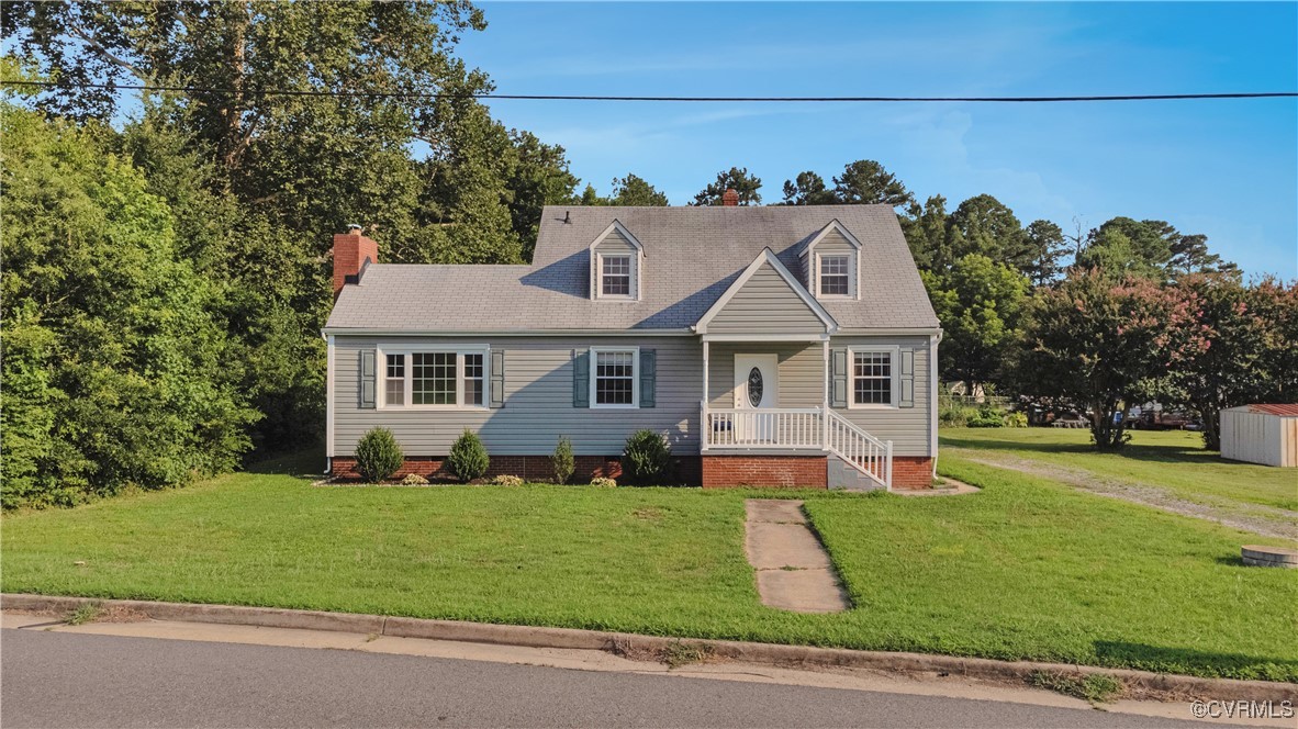 4305 Lakeview Road Petersburg, VA 23803 - Photo 4 of 45 Cape cod house featuring a front lawn, a chimney,