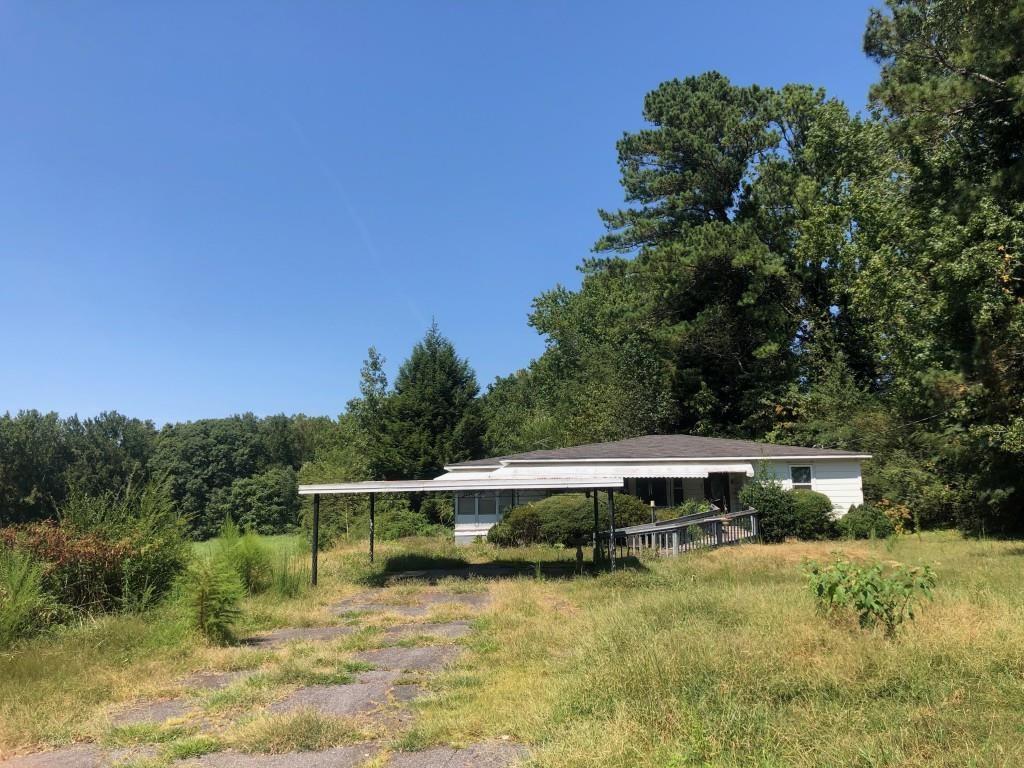 517 Kelly Mill Road Cumming, GA 30040 - Photo 9 of 9 a view of a house with a yard