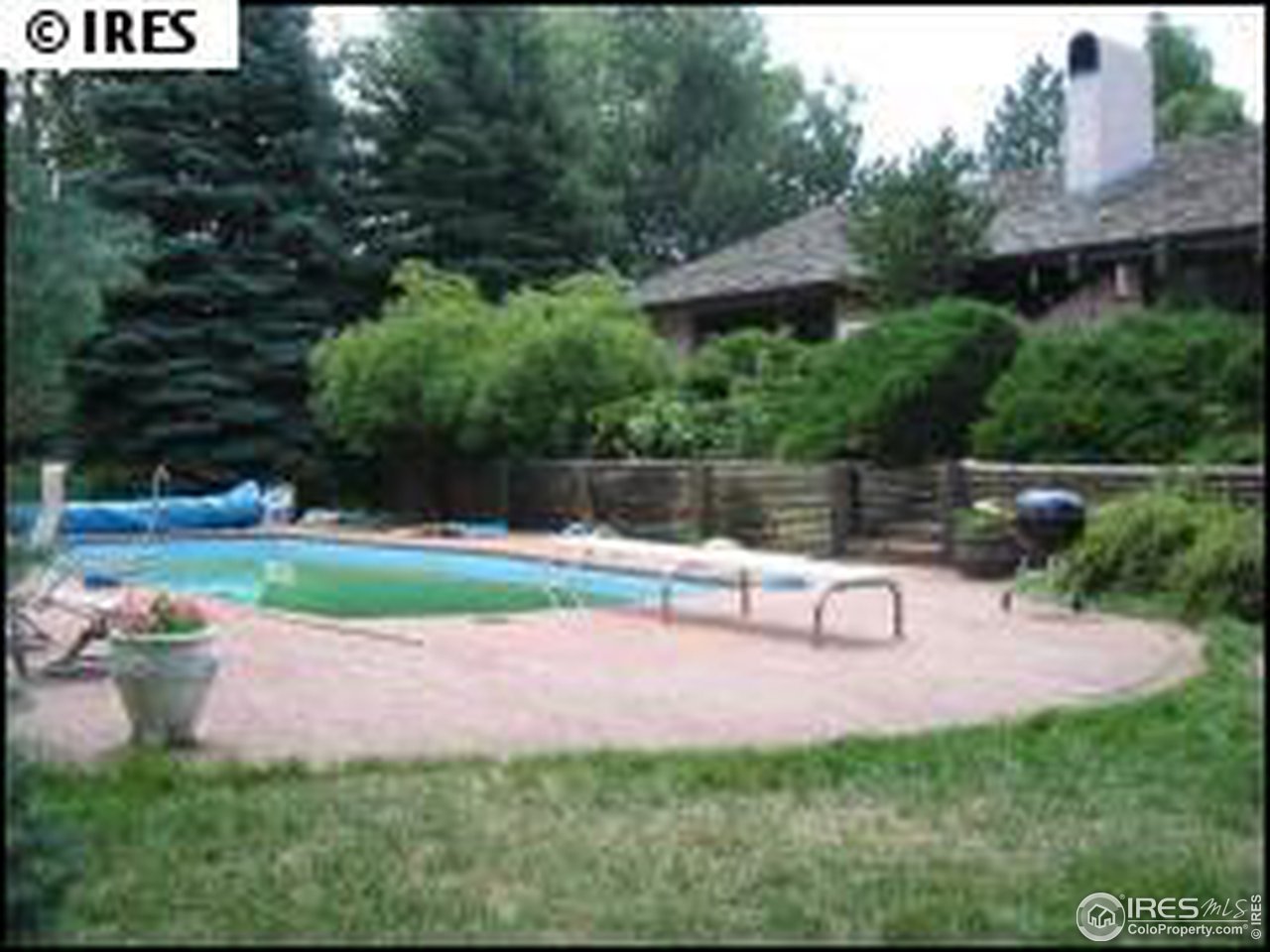 2967 Middle Fork Road Boulder, CO 80302 - Photo 18 of 18 a view of a bench in a garden
