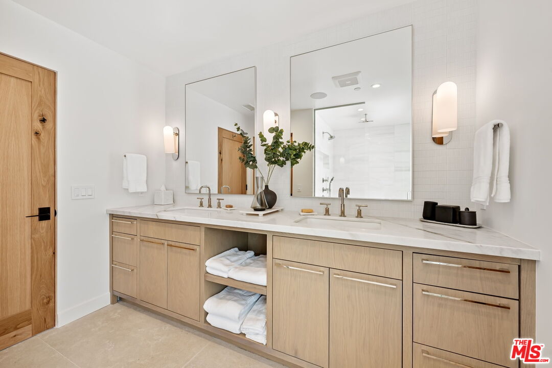 6326 Trancas Canyon Road Malibu, CA 90265 - Photo 28 of 53 a bathroom with a sink and a mirror