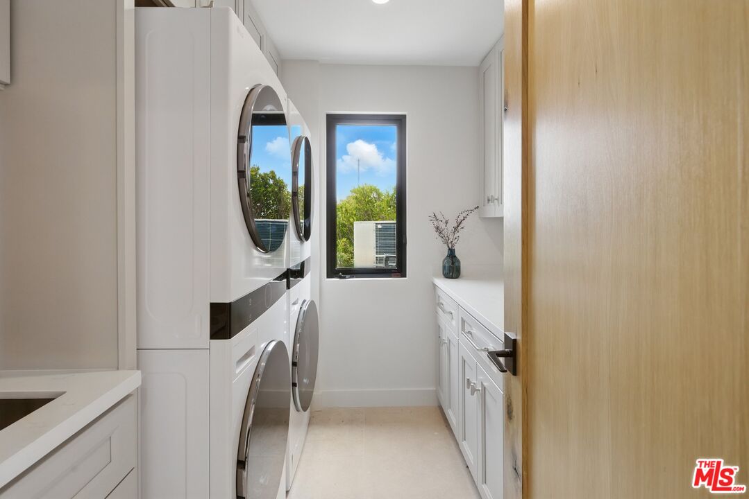 6326 Trancas Canyon Road Malibu, CA 90265 - Photo 41 of 53 a bathroom with a tub sink and mirror
