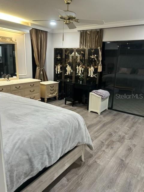 35 Pinewinds Boulevard Oldsmar, FL 34677 - Photo 21 of 36 a bedroom with a large bed and a large mirror